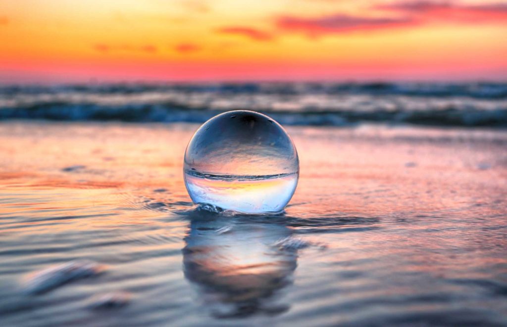 Crystal Ball in sea with sunset
